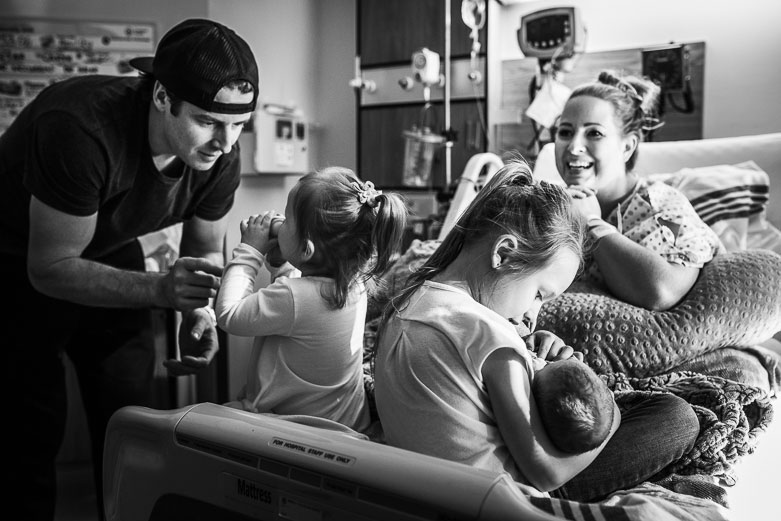 Family during a hospital newborn photo session